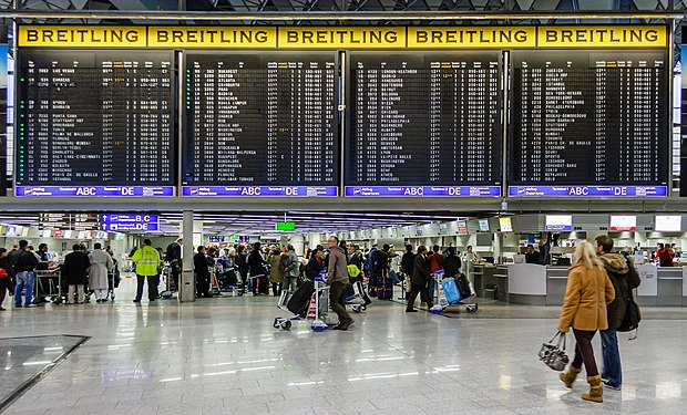 Split-flap display and airport check-in in Terminal 1 of Frankfurt Main Airport