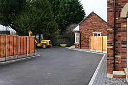 A photograph as close as possible to the single bungalow of the 'Malet Close' development on the corner of James Reckitt Avenue and Clifford Street in Kingston upon Hull.