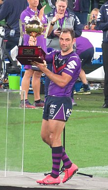 Cameron Smith holding the Michael Moore Trophy Michael Moore Trophy 2019.jpg