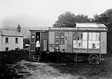 A portable photography studio in 19th-century Ireland. The wet collodion process sometimes gave rise to portable darkrooms, as photographic images needed to be developed while the plate was still wet. Micklethwaite Portable studio.jpg