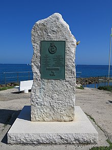 Monument in memory of the landing by Peter Churchill and his party from Unbroken in April 1942. Monument in memory of HMS Unbroken.jpg