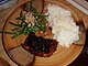 26. Moroccan pork chops with rice and green beans with almonds