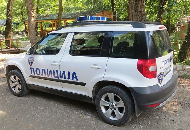 Macedonian police car, with the Macedonian word Полиција (Policija), for "police".