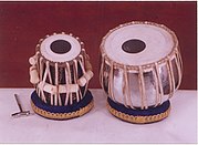 The track makes extensive use of the double hand-drum tabla, along with sitar. Prop. Tabla.jpg