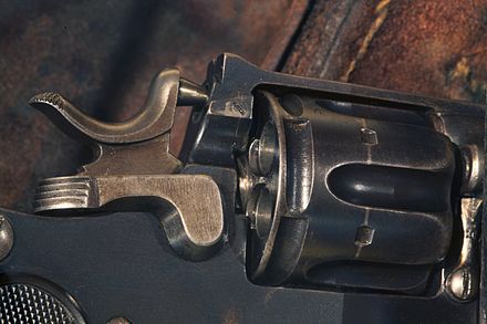 Details of a Schmidt M1882, showing the hammer, chambers for the ammunition in the cylinder, and the mechanism to rotate the cylinder. Revolver of the Gendarmerie of Vaud, on display at Morges castle museum