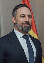 A headshot portrait of a man (José Sáenz Morales) looking right in a suit.