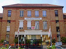 Edificio in mattoni che costituisce la sede della Croce Rossa francese, Parigi 14° arrondissement.