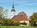 Church (with furnishings), cemetery with enclosure, memorial for those who fell in World War I and II, six tombs and tombs of those of Milkau (with four tombs)