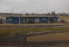 The existing South Bend Amtrak station (previously used by the South Shore Line before its current station was built) was studied as a potential site for the station's relocation. South Bend Station (23822027504) (1).jpg