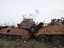 Destroyed BTR-60s as well as a destroyed AML armored car in a Tank graveyard near Asmara. The "Tank Graveyard" Asmara, Eritrea (30479695820).jpg