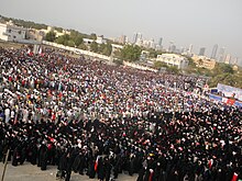 Thousands of demonstrators gather for "National demands: An elected government" rally in Karrana, Bahrain on 8 July. Thousands of demonstrators gather for "National demands An elected government" rally in Karrana, Bahrain.jpg