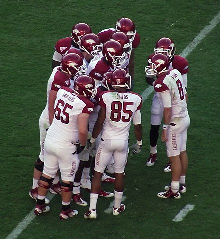 Quarterback Tyler Wilson leads the Razorbacks in the huddle vs Alabama (2011)