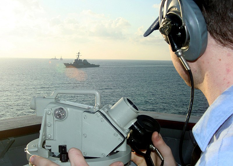 File:US Navy 070226-N-6710M-011 Quartermaster Seaman David B. Heismann takes bearings as dock landing ship USS Tortuga (LSD 46) passes through the busy waterways of Okinawa, Japan.jpg