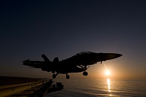 US Navy 120126-N-TZ605-406 An F-A-18F Super Hornet assigned to Strike Fighter Squadron (VFA) 22 launches from the Nimitz-class aircraft carrier USS.jpg