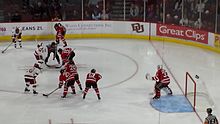 University of Denver (in white) men's ice hockey vs. Rensselaer Polytechnic Institute (in red), Magness Arena Uni of Denver vs RPI.jpg