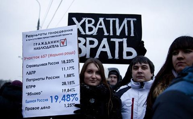 Protesters, 10 December, Bolotnaya Square, signs saying "Stop lying!" and listing the number of votes for each party on one of the polling stations, w