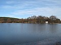 Čeština: Pohled k hrázy Velkého chotilského rybníku. Okres Příbram, Česká republika. English: Dam of Velký chotilský rybník (pond), Příbram District, Czech Republic.