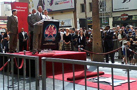 McMahon receiving a star on the Hollywood Walk of Fame in 2009