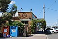 English: A clock on the external wall of a shop at en:Warracknabeal, Victoria