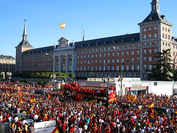 World Cup champions parade celebrate as they pass in front of the Air Force Headquarters in Madrid.