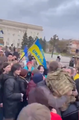 ZSU female soldier lifted on shoulders Kherson Freedom Square.png