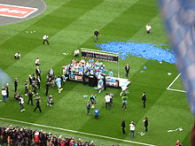 The Manchester City team celebrating winning the FA Cup 2011FACupFinalWinners.JPG