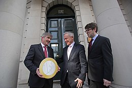 Irish Debt Securities Association (IDSA) launch in 2013 with Minister Richard Bruton, IDSA CEO Gary Palmer, and IDSA Chairman Turlough Galvin of Matheson's Tax Practice. 2013 launch of the Irish Debt Securities Association (IDSA).jpg