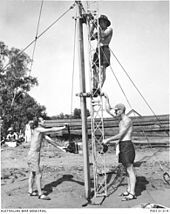 A radio antenna is erected for the test. A radio antenna being constructed for the British Operation Hurricane nuclear test.jpg