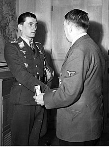 Adolf Hitler hands the award to Walter Nowotny.jpg