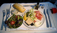 A gourmet appetizer and seasonal salad served in Air France's Business cabin