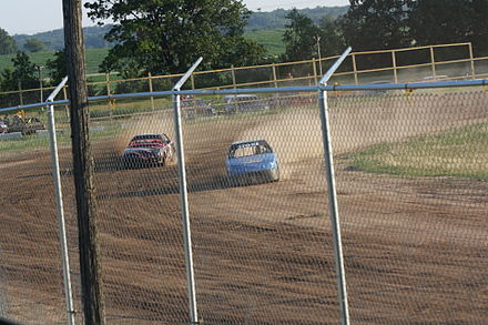 4 cylinder stock cars racing at the county fairgrounds