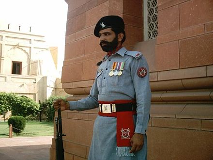 A Ranger in ceremonial dress guarding the Tomb of Muhammad Iqbal in Iqbal Park, Lahore.