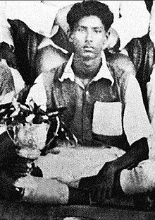 Mujib with a trophy after winning a football match in 1940 Bangabandhu Sheikh Mujibur Rahman in Dhaka Wanderers jersey in 1940.jpg