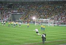 Beckham takes the free kick against Brazil from which John Terry scored