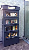 Bookcase in front of the Starnberg seaside resort