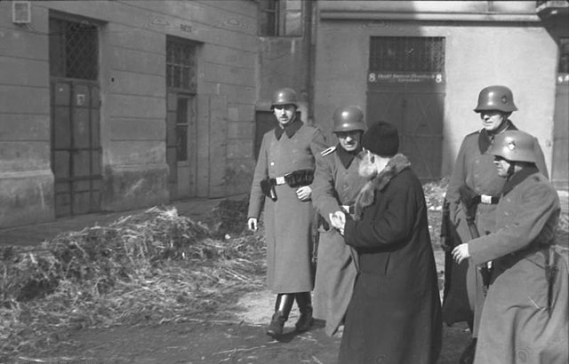 Ordnungspolizei conducting a raid (razzia) in the Kraków ghetto, 1941