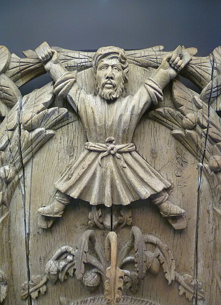 Saint Andrew depicted on a coat-of-arms of the burgh, now in the St. Andrews Museum