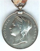 First version of medal, issued without a clasp, with ring suspension Central Africa Medal, obverse. Ring suspension.jpg