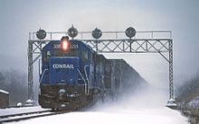 A Conrail train led by EMD GP40 3209 at Duncannon, Pennsylvania Conrail GP40 3209 at Ducannon, PA (25175006459).jpg