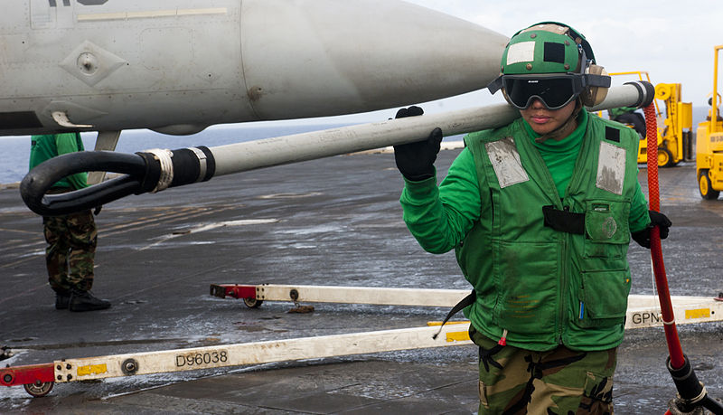 File:Defense.gov News Photo 120208-N-OY799-189 - Petty Officer 3rd Class May Enjambre carries a cargo hook on the flight deck of the aircraft carrier USS John C. Stennis CVN 74 during a.jpg