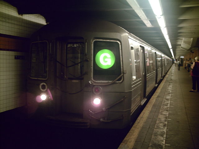 A Queens-bound G train of R68s at Seventh Avenue in 2011