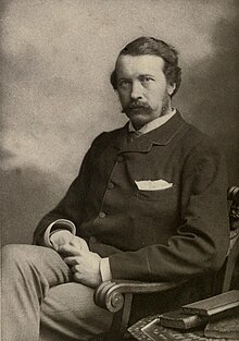 George John Romanes, fotografia de Elliott & Fry.jpg