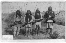 Geronimo (right) and his warriors in 1886 Geronimo, son and two picked braves. Man with long rifle Geronimo LCCN2016650886.tif