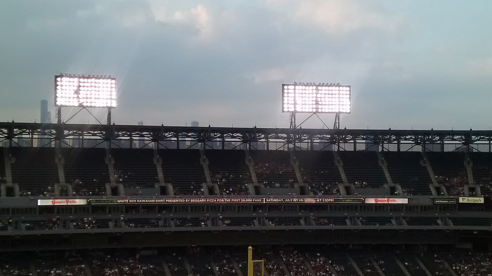 The Chicago skyline overlooking the upper deck behind third base at Guaranteed Rate Field on June 30, 2017