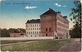 English: Historical postcard with the building of today's Slovanské gymnázium. It was postmarked in July 1919. Čeština: Historická pohlednice s budovou České reálky (dnešní Slovanské gymnázium). Razítko na rubu je z července 1919.