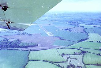 World War II airfield in centre of picture, village of Horham to the right Horham.jpg