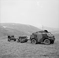 Morris-Commercial C8 'Quad' artillery tractor with limber and 25-pdr field gun, on an exercise in Scotland, 20 March 1941.