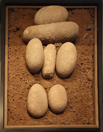 Schematic human figure made of pebbles, from Eynan, Early Natufian, 12,000 BC