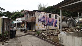 Pig mural in semi-abandoned village, Lamma Island, Hong Kong