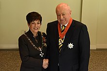 Friedlander in 2016, after his investiture as a Knight Companion of the New Zealand Order of Merit by the governor-general, Dame Patsy Reddy Michael Friedlander KNZM investiture.jpg